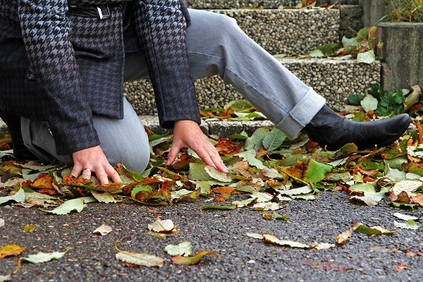 Person at bottom of stairs following a slip and fall accident