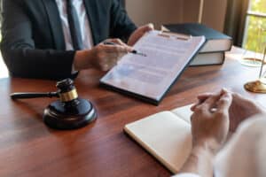 Male,Notary,Lawyer,Or,Judge,Consult,Or,Discussing,Contract,Papers